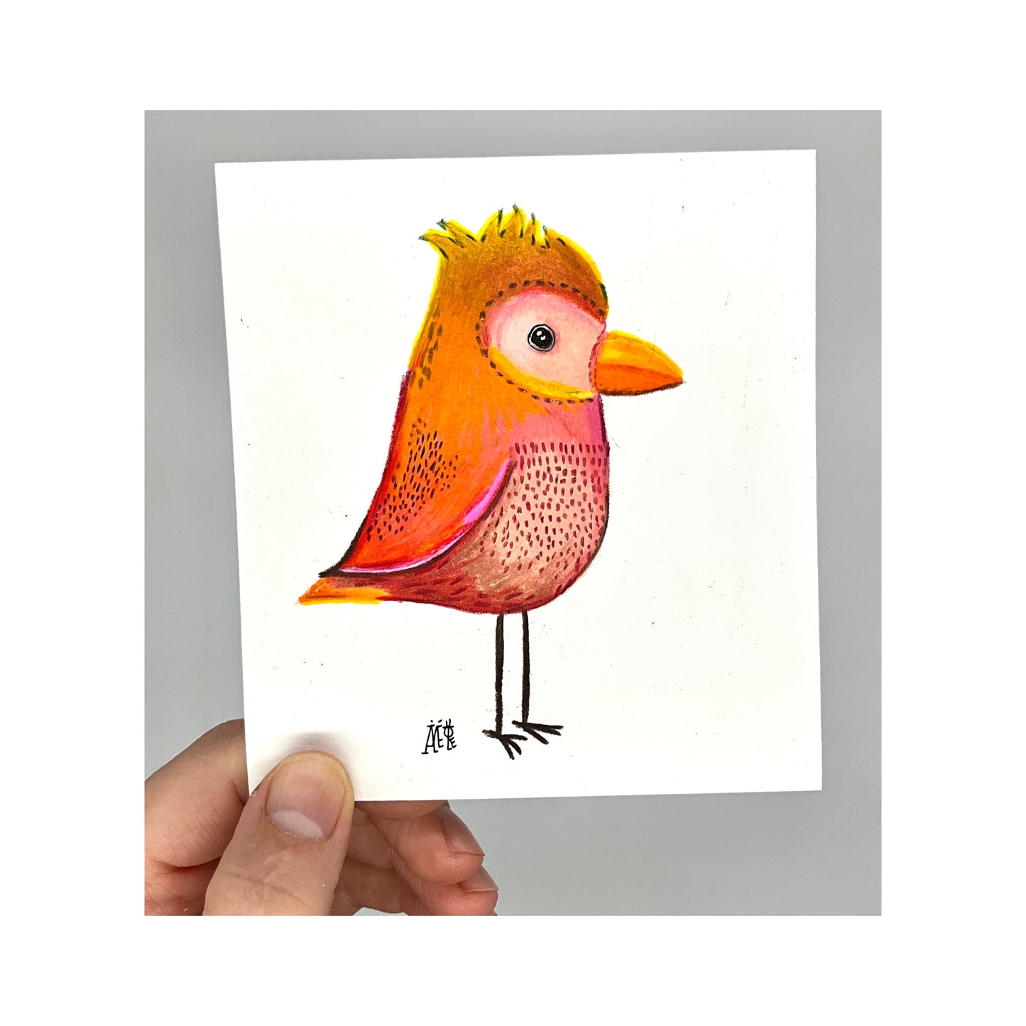 Oiseau dessiné aux crayons de couleur, dans les tons orangés