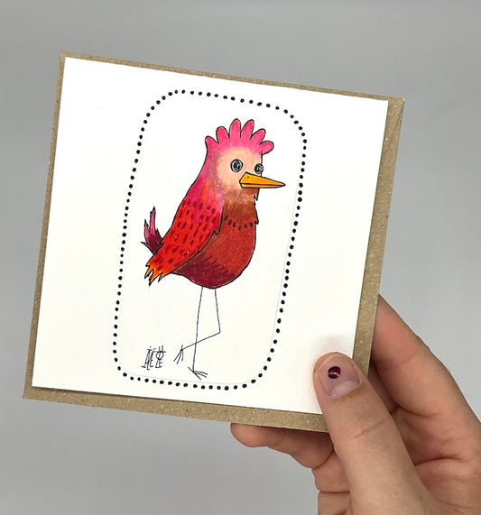 Carte double unique avec le dessin d'un oiseau avec une crête rose et un plumage rouge. Idéale pour accompagner un cadeau à un proche