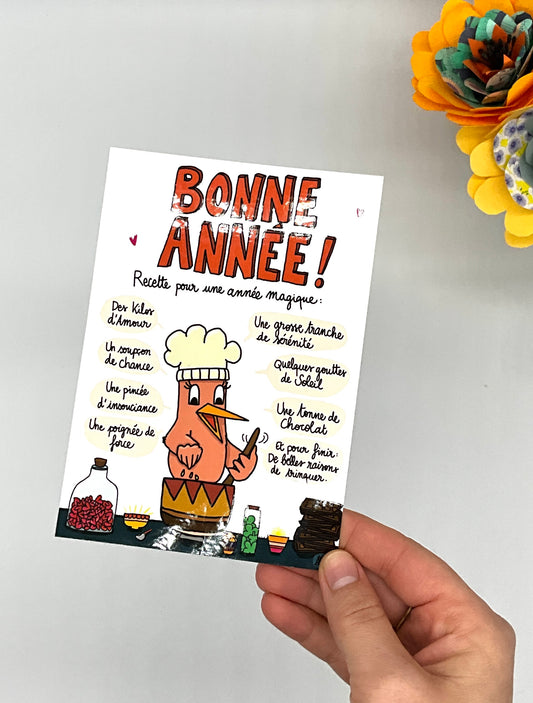 Carte de bonne année avec un oiseau qui cuisine et qui donne la recette pour avoir une belle année