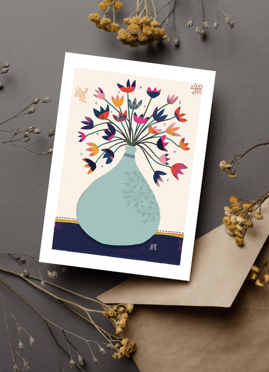 Carte représentant un bouquet de fleurs colorées. idéale pour un adulte