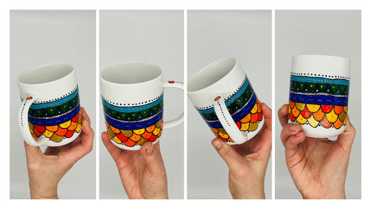 Mug en porcelaine peint à la main avec des motifs colorés. Idéal pour le café, un thé ou un chocolat chaud. Pièce unique