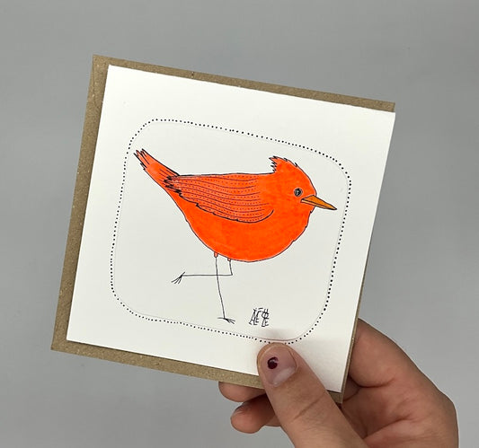Carte double unique avec le dessin d'un rouge oiseau rouge fluo. 