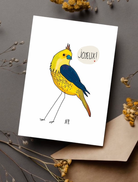 Dessin représentant un oiseau jaune avec des ailes bleues. Il dit "joyeux" Carte postale idéale pour souhaiter un anniversaire ou autre. Papeterie originale.