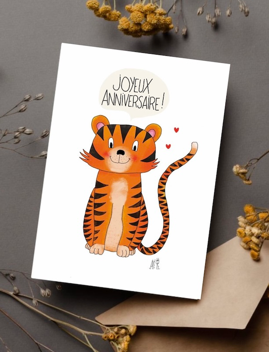 Dessin d'un tigre mignon destiné à illustrer une carte postale. Pour un anniversaire. Idéal pour un enfant. Papeterie française
