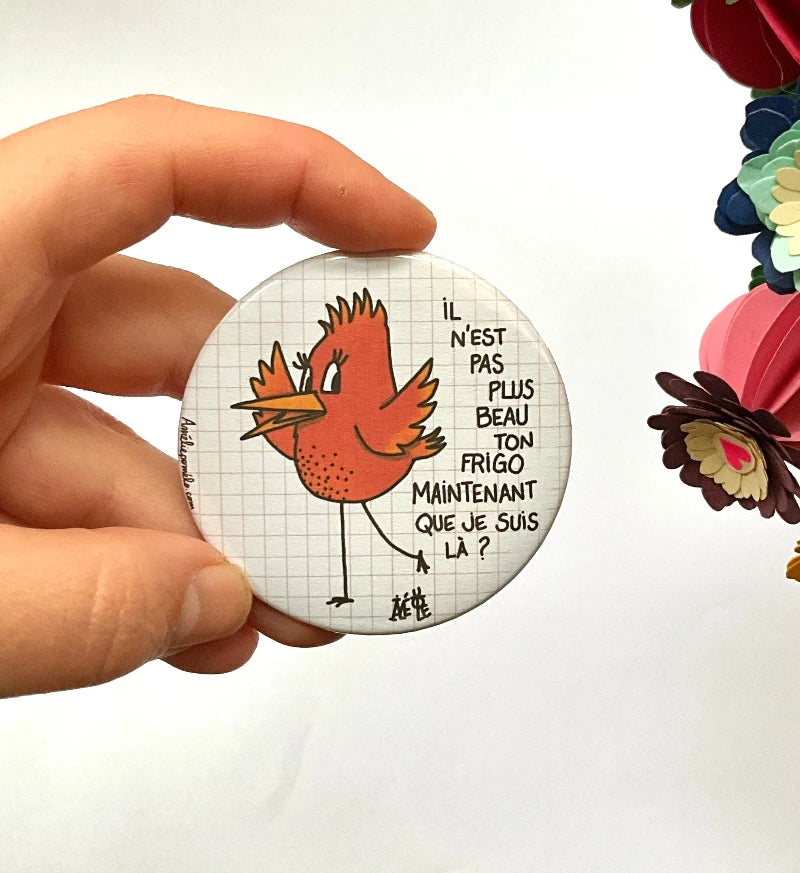 Magnet rond et grand avec un dessin d'oiseau rouille et une phrase humoristique