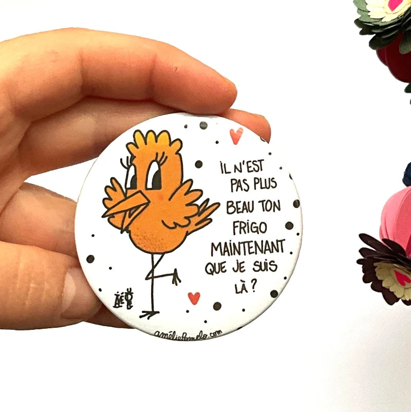 Magnet rond avec un oiseau jaune et une phrase humoristique